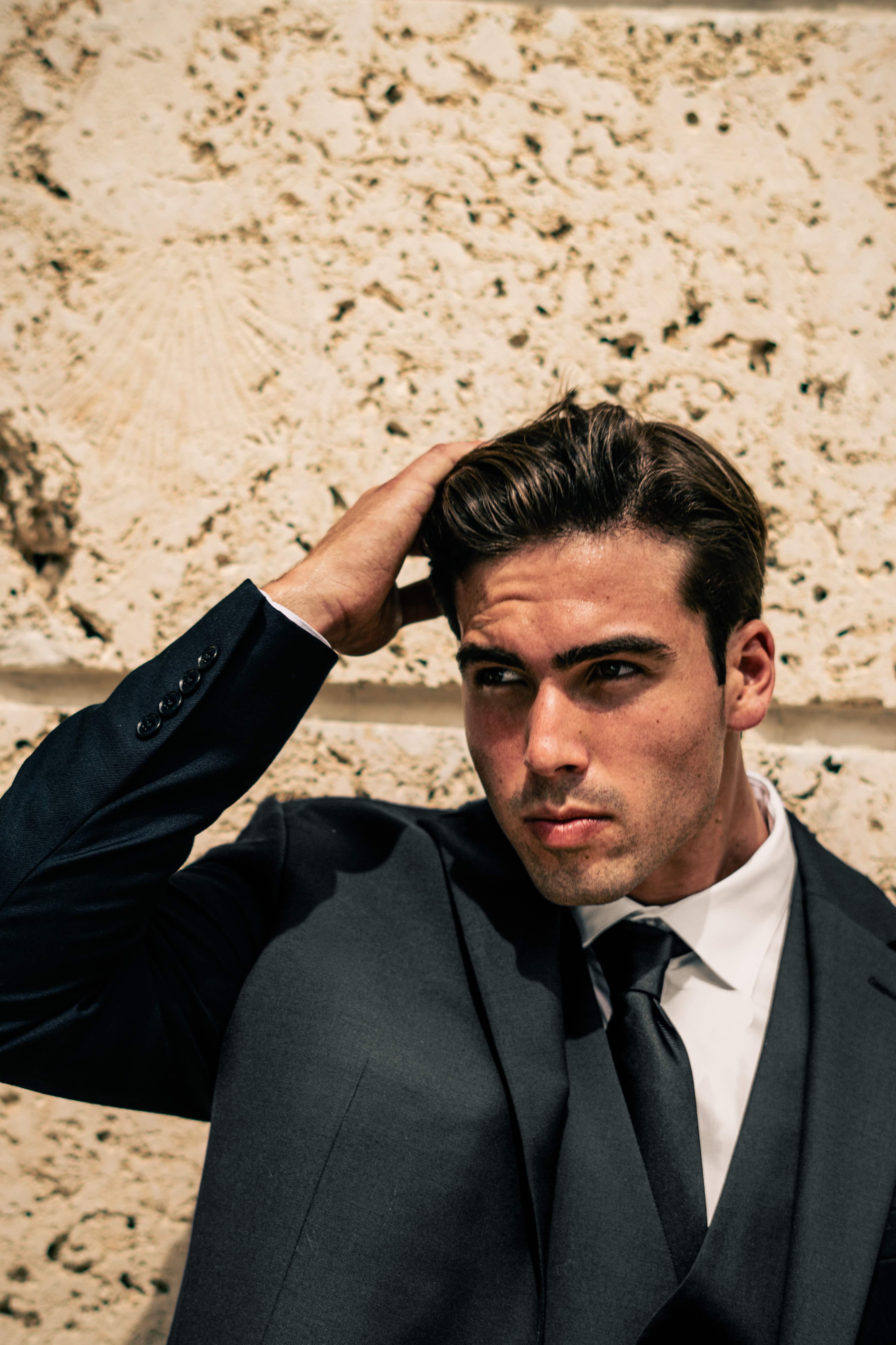 Christian Utne portrait in a grey suit